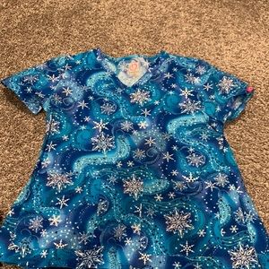 Glitter blue scrub top.